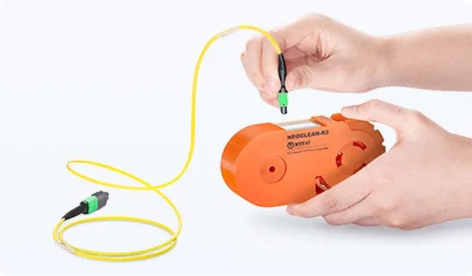 Cleaning MTP®/MPO connectors with IBC MPO cleaner.