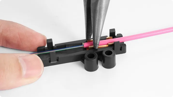 Crimp the pre-stripped cable with the base