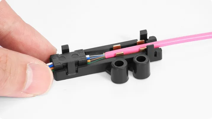 Install the head of the fan-out assembly to the base and make sure the fibers are not twisted